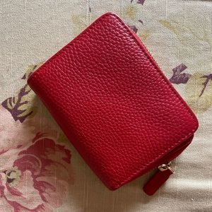 “The Horse” Bifold wallet red leather with zipped coin area.Excellent condition!